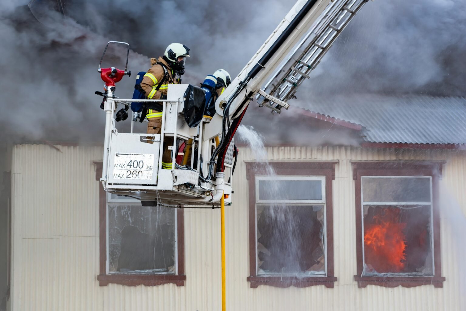 Control of Substances Hazardous to Health (COSHH) Training Course 1 Firemen putting out fire in a residential house